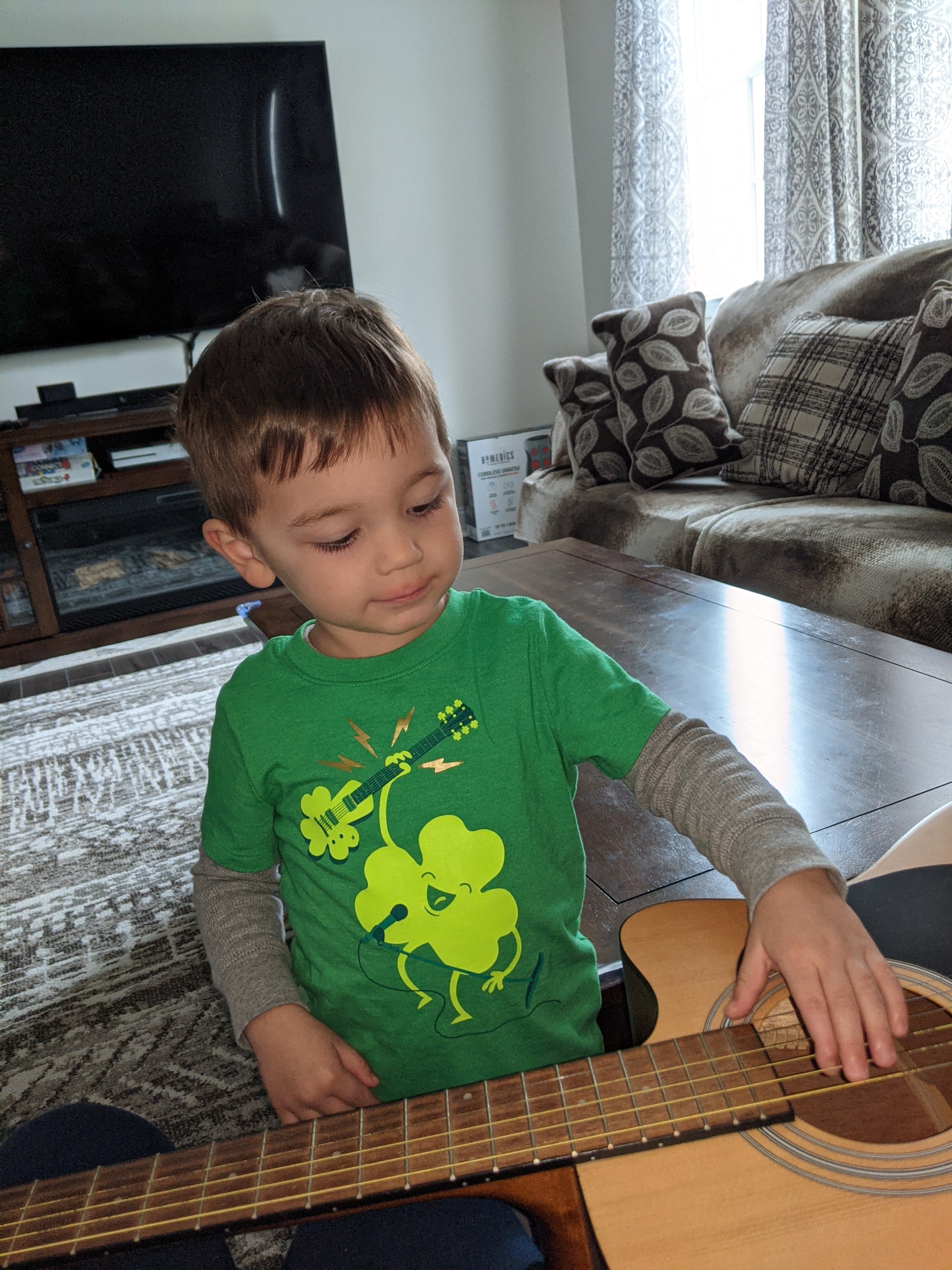 Picture_of_Sweet_Kids_Smiling_with_Guitar